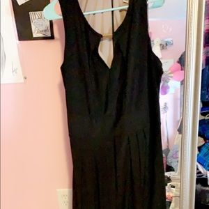 Long all black prom dress. Does not have a slit.